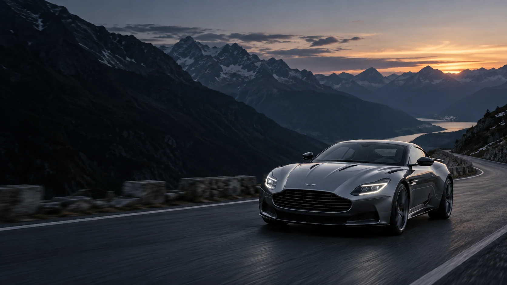 Silver sports coupe on a sweeping Alpine road at dusk